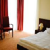 Zimmer mit Doppelbett im Hotel Falukozpont Ujhartyan